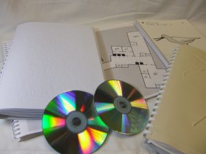 photo of braille, large print, tactile images and DAISY cds