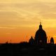 Glorious sunset in Rome with the silhouette of St Peter's Basilica dominating the skyline