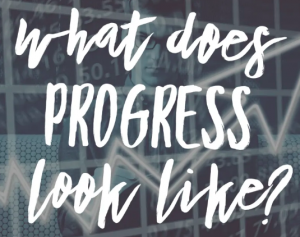 The words "What Does progress look like?"