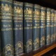 A shelf full of various volumes of encyclopedia britannica to depict a wealth of knowledge
