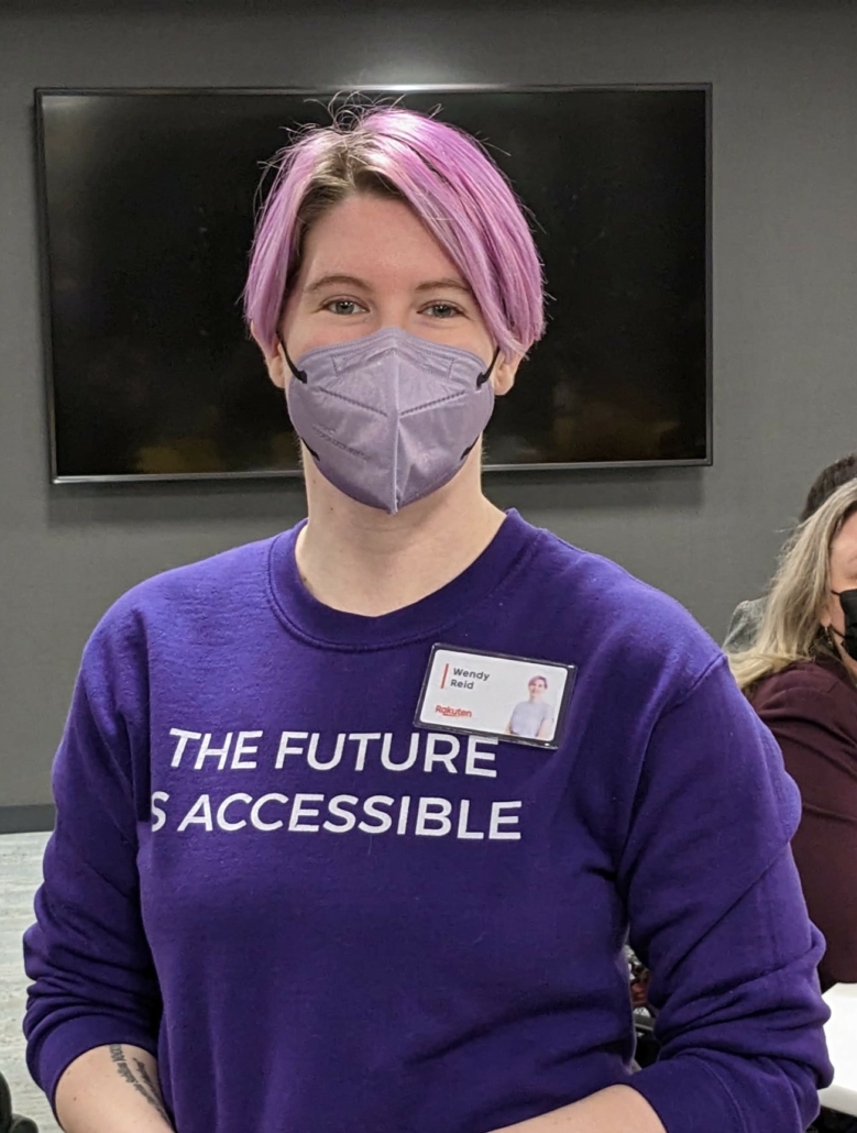 Kobo's WEndy Reid dressed in a purple top with the words "The Future is Accessible" printed on the front